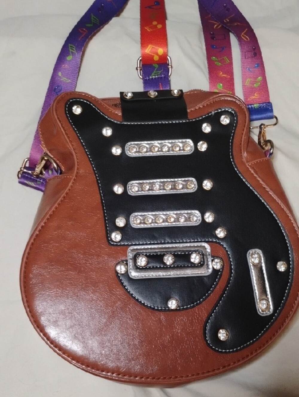 Brown and Black Guitar-Shaped Crossbody Bag with Colorful Strap - Picture 2 of 6